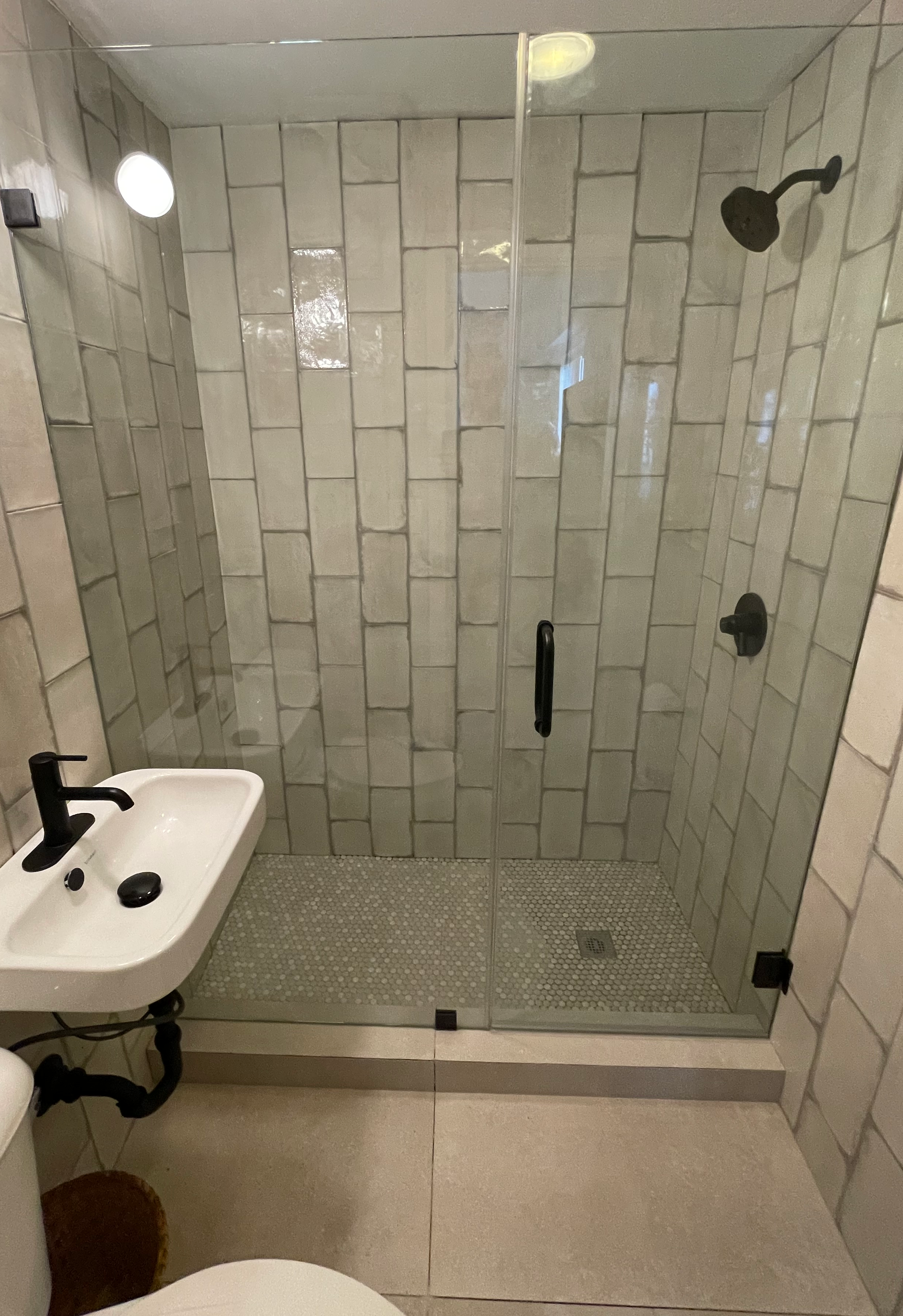 Transforming Spaces with Ceramic Tile and Black Accents